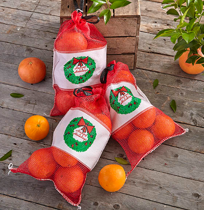 Three Grove Stand bags of juicy-fresh oranges or grapefruit.